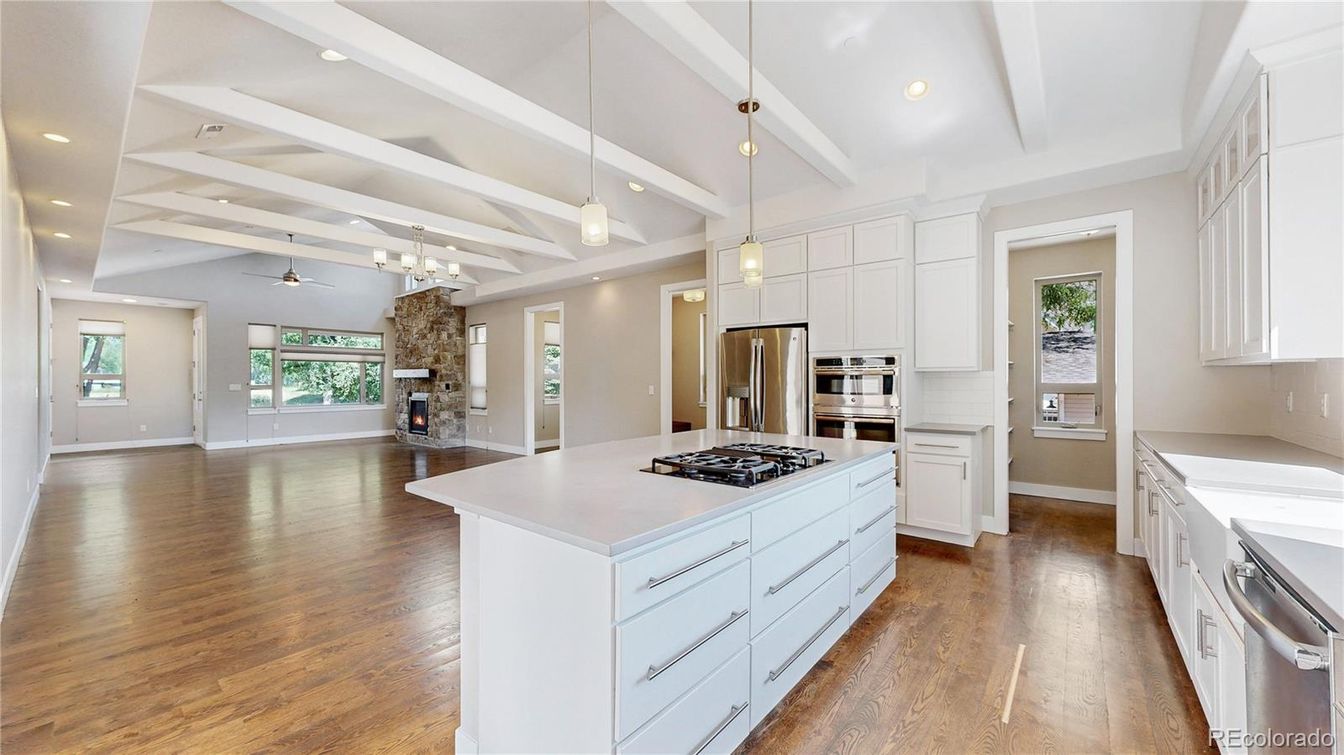 Fireplace, Interior, Kitchen, Pendant Lights, Recessed Lighting, Stainless Steel Appliances, Wood Texture Flooring