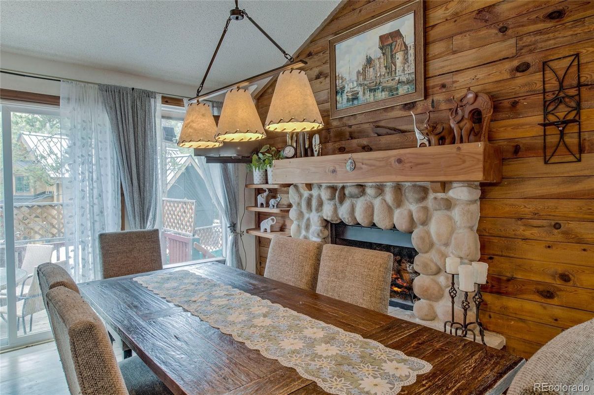 Dining room, Fireplace, Interior, Pendant Lights, Wood Texture Flooring, Wooden Walls