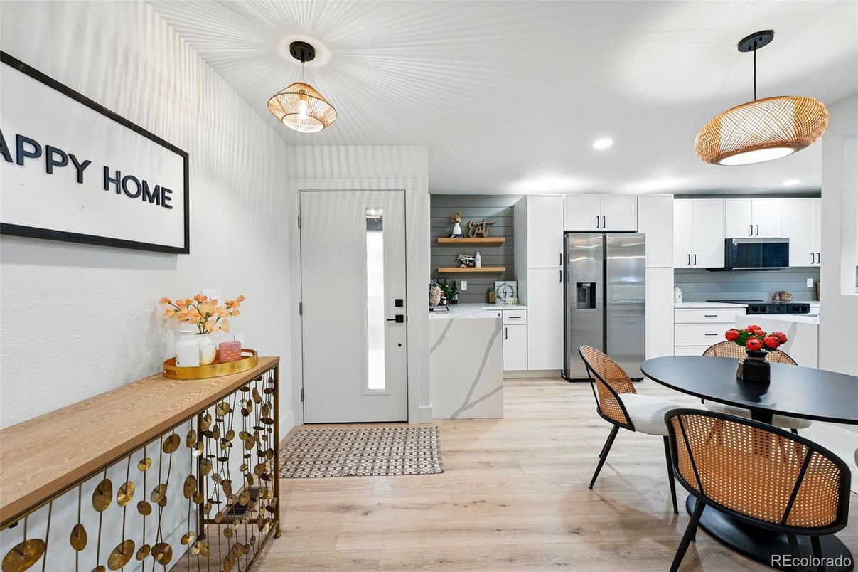 Dining room, Interior, Kitchen, Pendant Lights, Recessed Lighting, Stainless Steel Appliances, Wood Texture Flooring