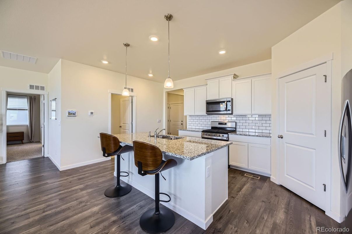 Interior, Kitchen, Pendant Lights, Recessed Lighting, Stainless Steel Appliances, Wood Texture Flooring