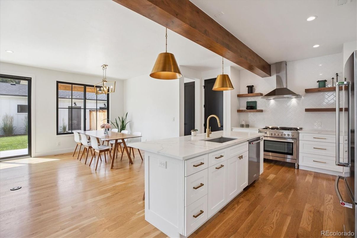 Dining room, Interior, Kitchen, Pendant Lights, Recessed Lighting, Stainless Steel Appliances, Wooden Beams, Wood Texture Flooring