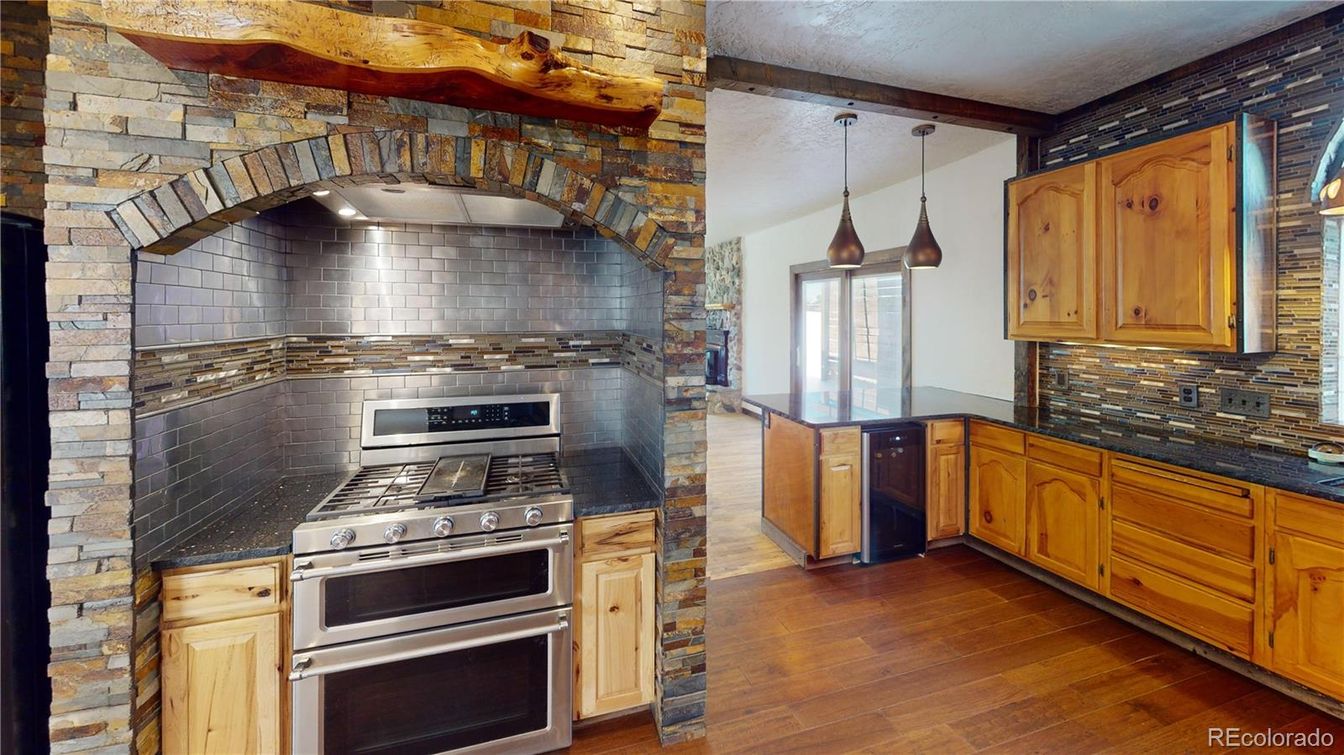 Interior, Kitchen, Pendant Lights, Stainless Steel Appliances, Stone Walls, Wood Texture Flooring