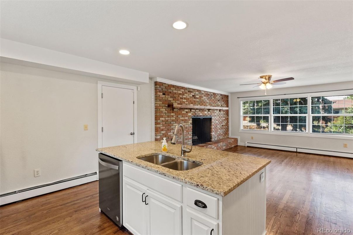 Fireplace, Interior, Kitchen, Recessed Lighting, Stone Walls, Wood Texture Flooring