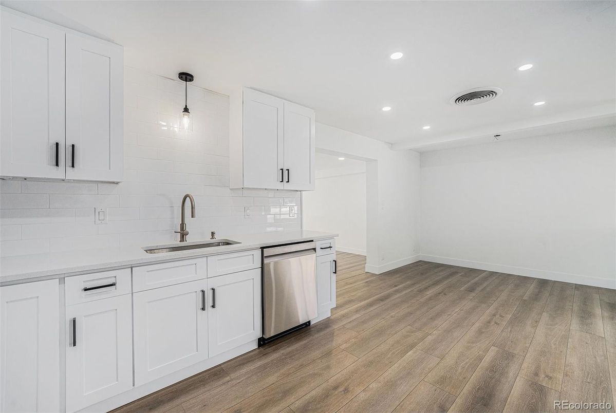 Interior, Kitchen, Pendant Lights, Recessed Lighting, Stainless Steel Appliances, Wood Texture Flooring