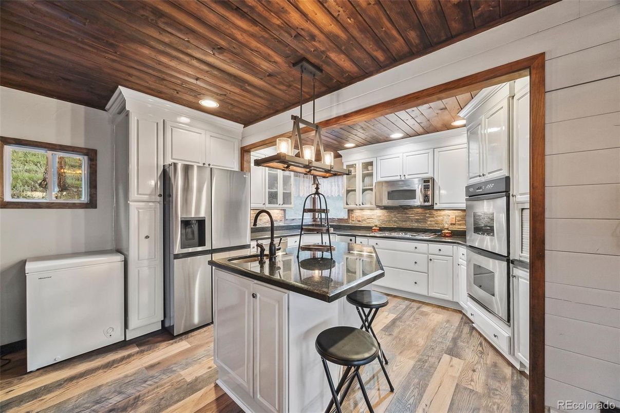 Interior, Kitchen, Pendant Lights, Recessed Lighting, Stainless Steel Appliances, Wooden Ceilings, Wood Texture Flooring