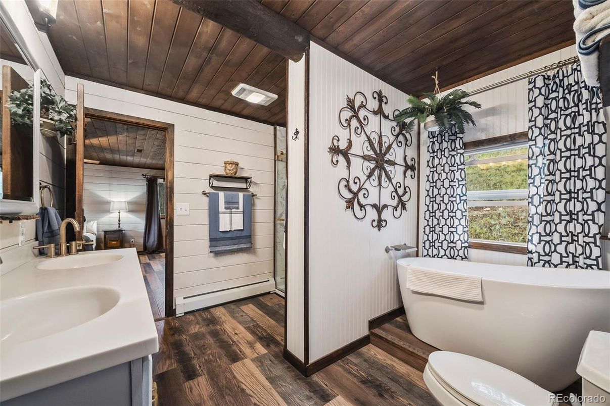 Bathroom, Dual Sink Vanities, Free Standing Baths, Interior, Wooden Ceilings, Wood Texture Flooring, Wooden Walls