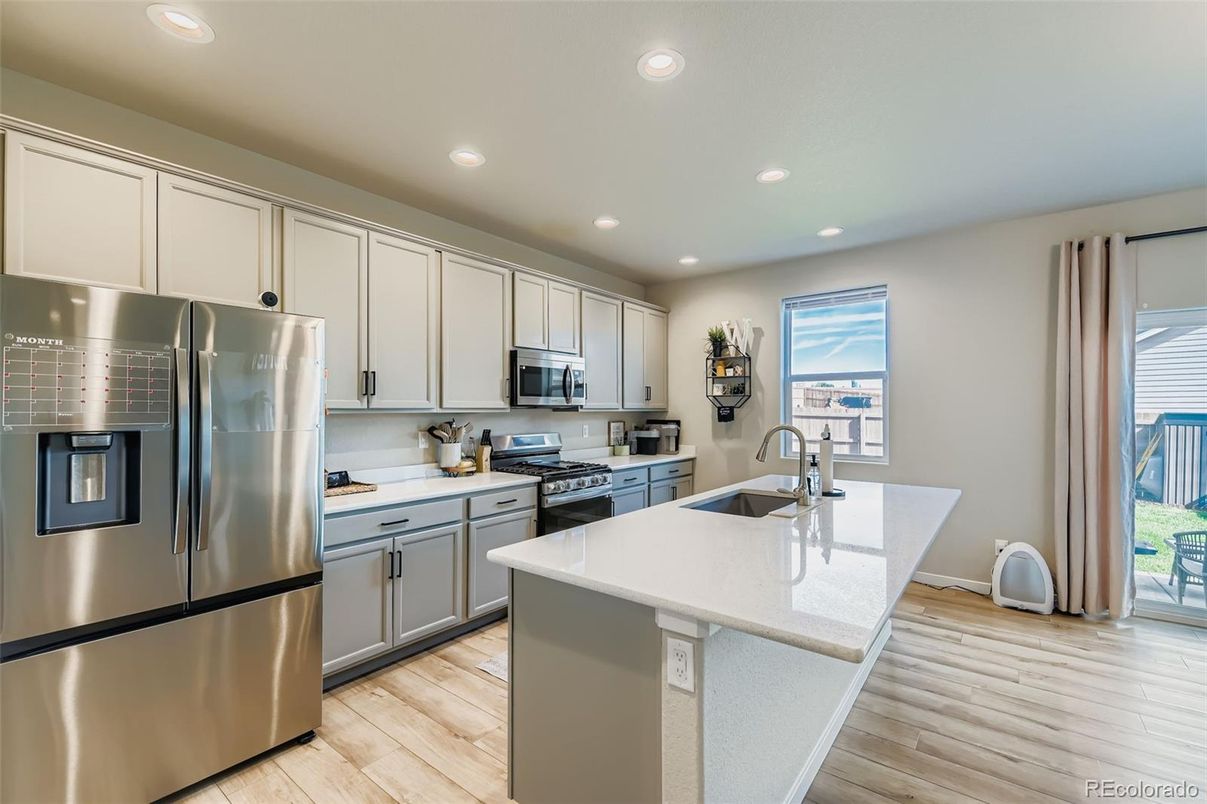 Interior, Kitchen, Recessed Lighting, Stainless Steel Appliances, Wood Texture Flooring