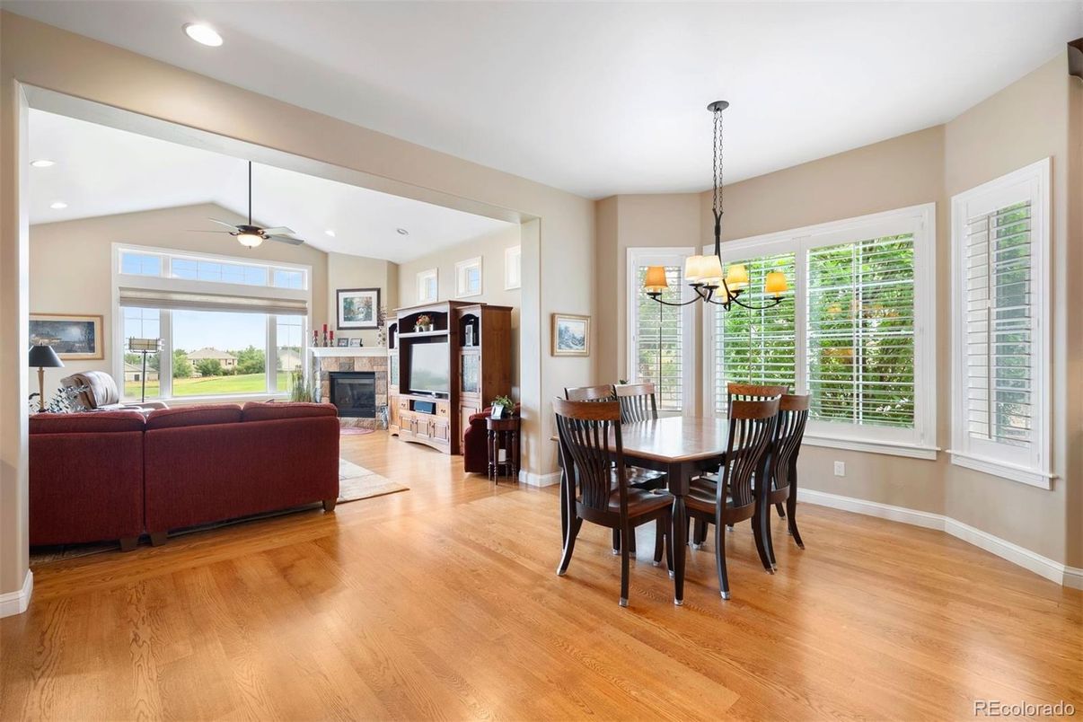 Chandelier, Dining room, Fireplace, Interior, Living room, Recessed Lighting, Wood Texture Flooring