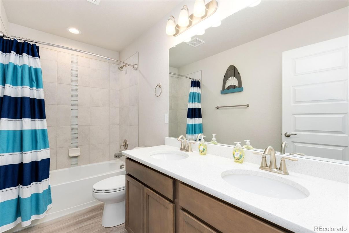 Bathroom, Dual Sink Vanities, Interior, Recessed Lighting, Wood Texture Flooring