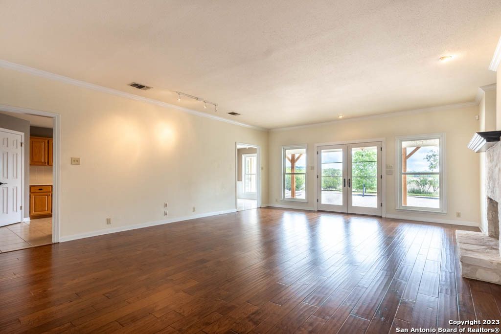 Empty room, Fireplace, Interior, Recessed Lighting, Wood Texture Flooring