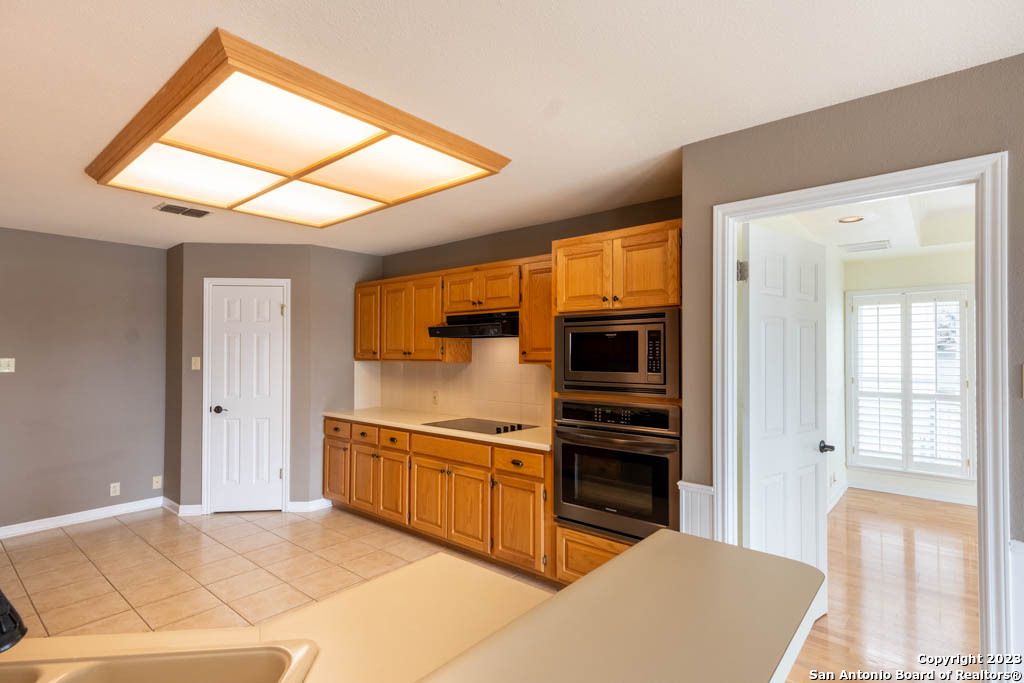Interior, Kitchen, Recessed Lighting, Tile Countertops
