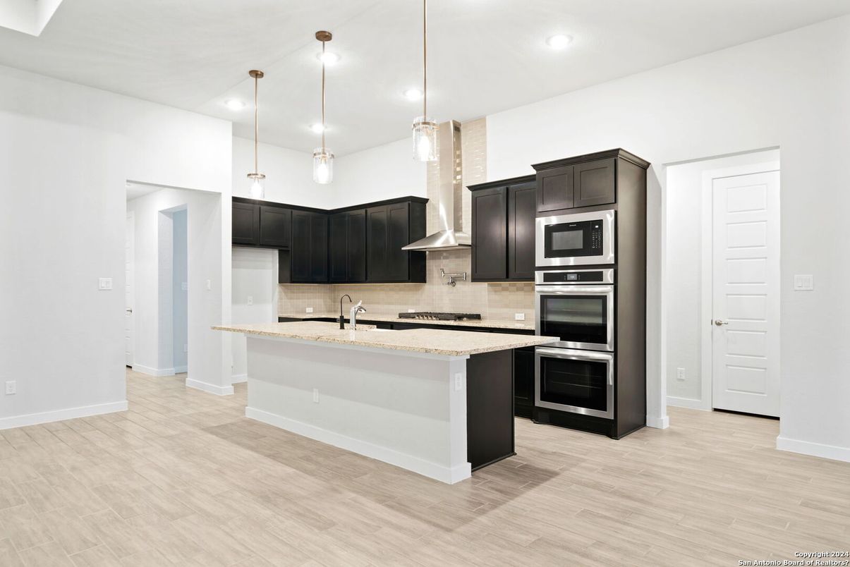 Interior, Kitchen, Pendant Lights, Recessed Lighting, Stainless Steel Appliances, Wood Texture Flooring