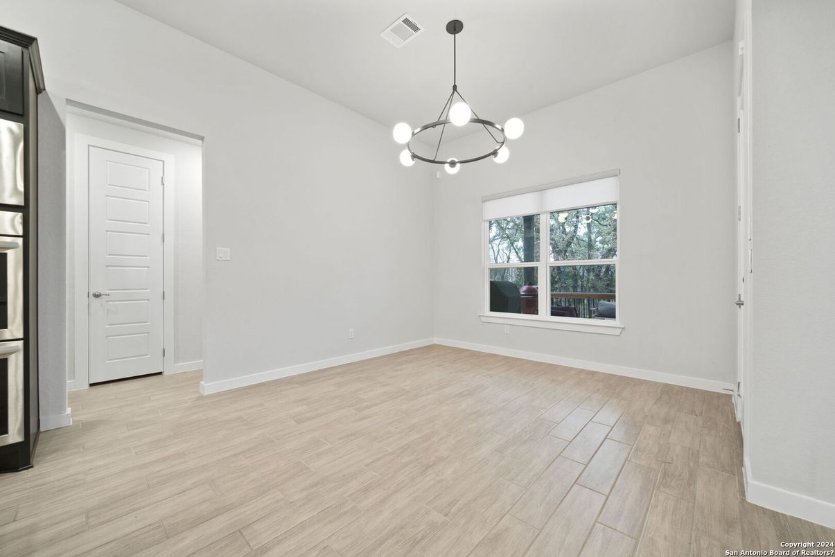 Empty room, Interior, Pendant Lights, Wood Texture Flooring