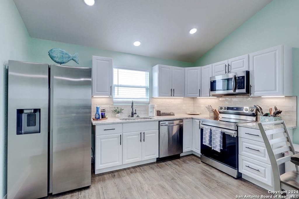 Interior, Kitchen, Recessed Lighting, Stainless Steel Appliances, Wood Texture Flooring