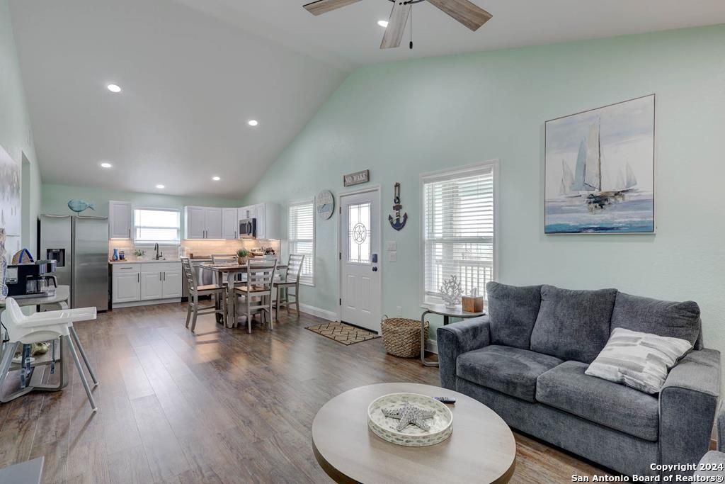 Dining room, Interior, Kitchen, Living room, Recessed Lighting, Stainless Steel Appliances, Wood Texture Flooring
