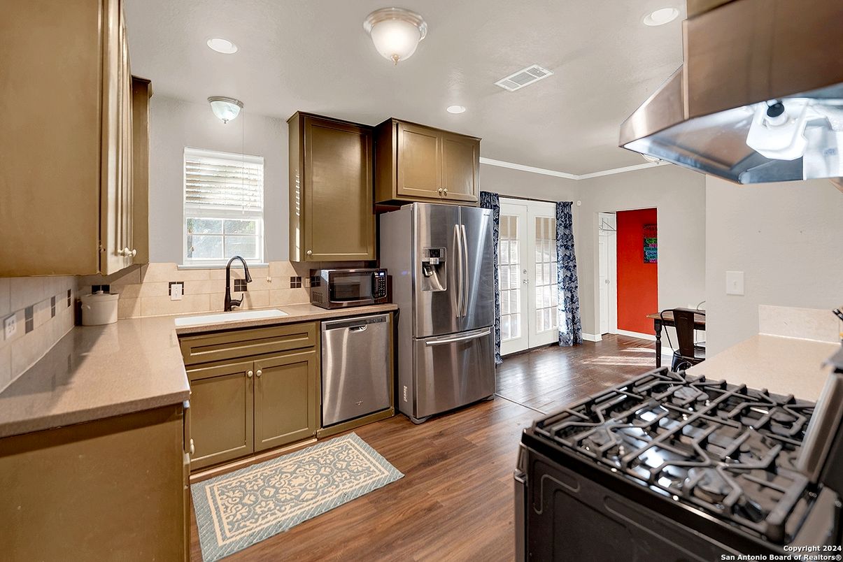 Interior, Kitchen, Recessed Lighting, Stainless Steel Appliances, Wood Texture Flooring