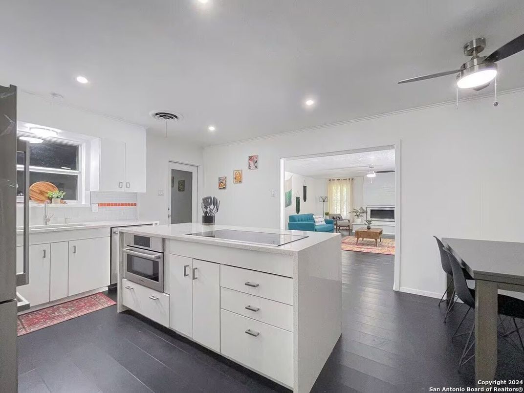 Dining room, Interior, Kitchen, Recessed Lighting, Stainless Steel Appliances, Wood Texture Flooring