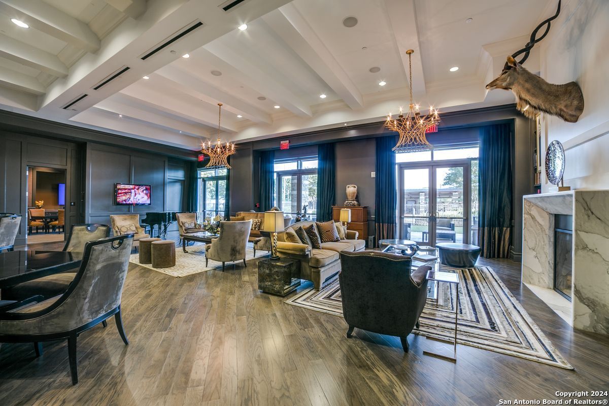 Chandelier, Dining room, Fireplace, Interior, Living room, Recessed Lighting, Wood Texture Flooring