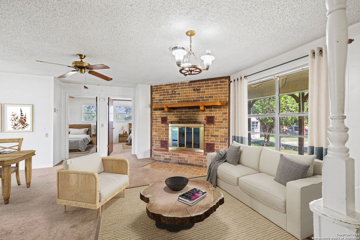 Chandelier, Fireplace, Interior, Living room, Stone Walls
