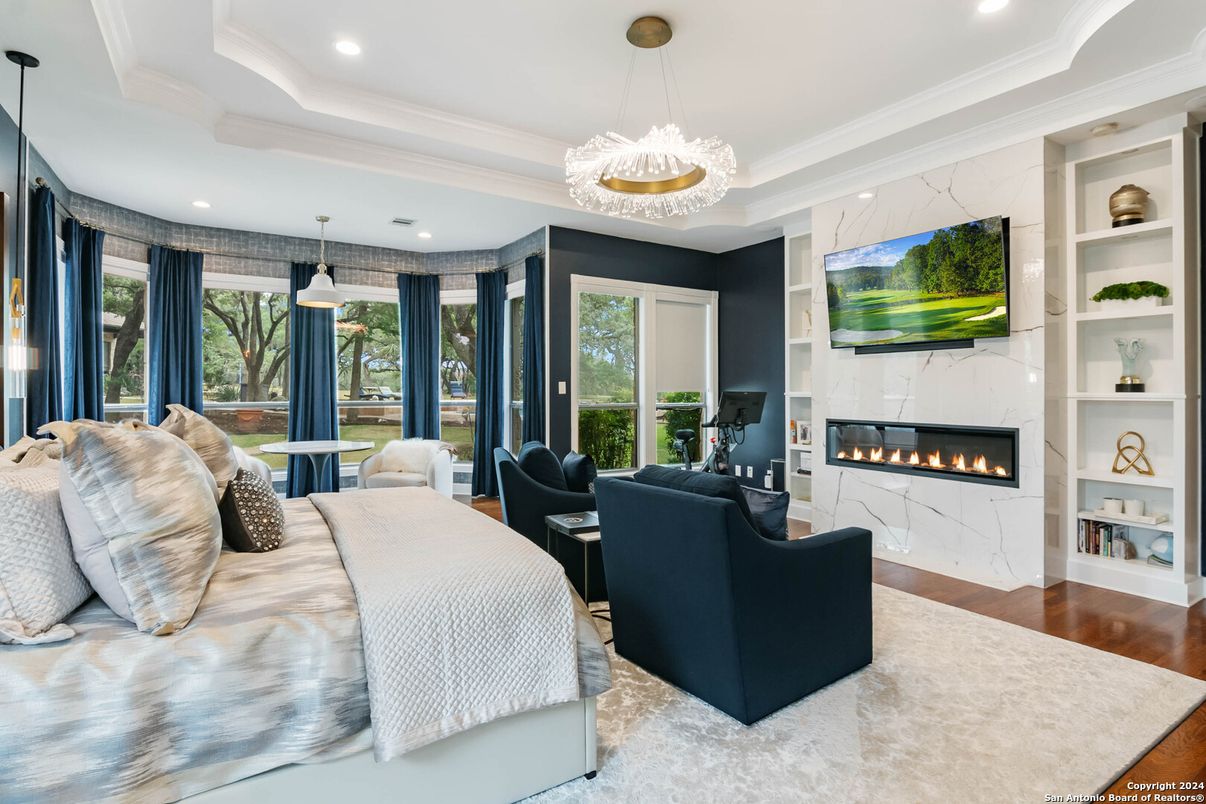Bedroom, Fireplace, Interior, Living room, Pendant Lights, Recessed Lighting, Wood Texture Flooring