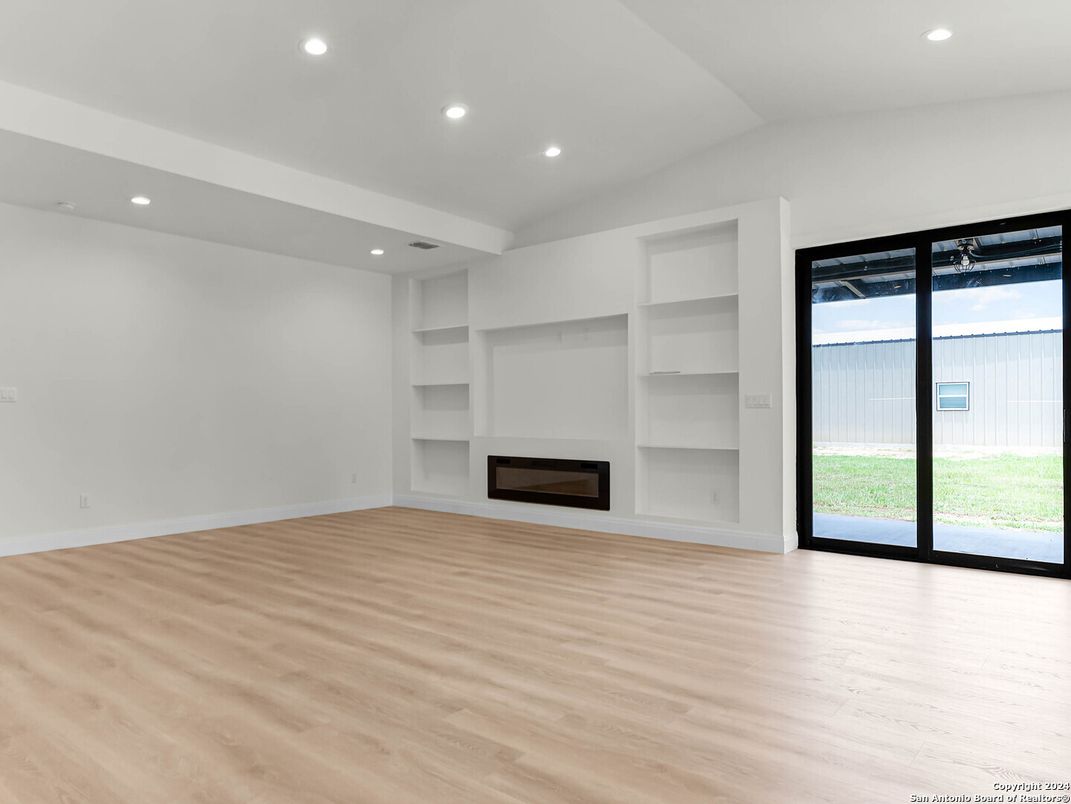 Empty room, Fireplace, Interior, Recessed Lighting, Wood Texture Flooring