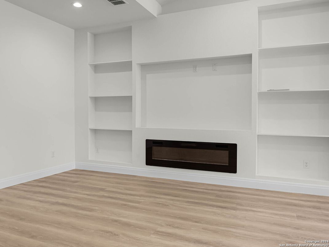 Empty room, Fireplace, Interior, Recessed Lighting, Wood Texture Flooring