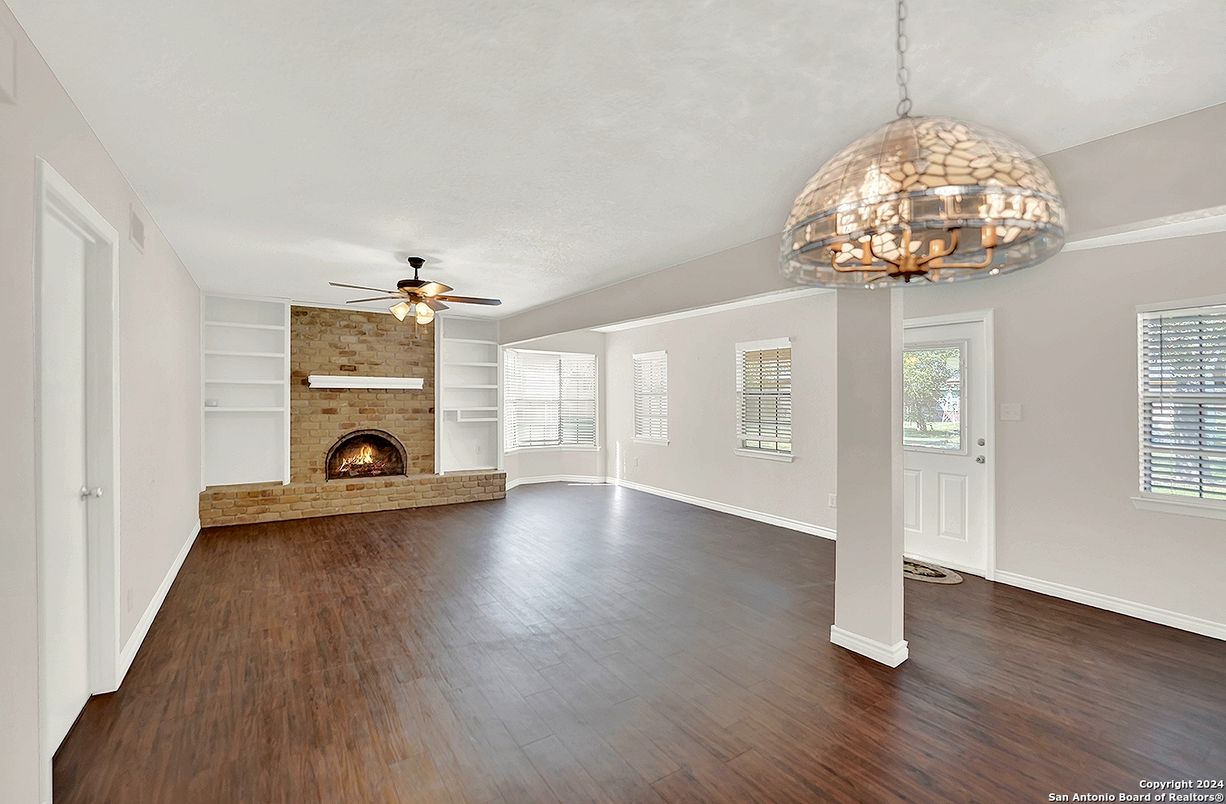 Empty room, Fireplace, Interior, Pendant Lights, Wood Texture Flooring