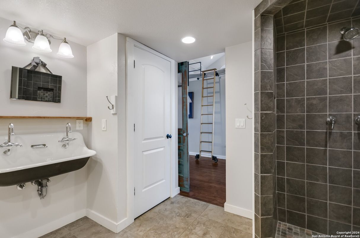 Bathroom, Dual Sink Vanities, Interior, Recessed Lighting, Wood Texture Flooring