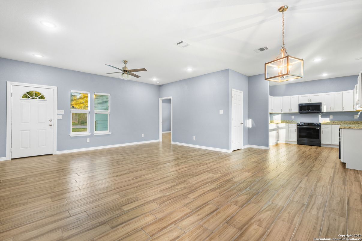 Empty room, Interior, Kitchen, Pendant Lights, Recessed Lighting, Wood Texture Flooring
