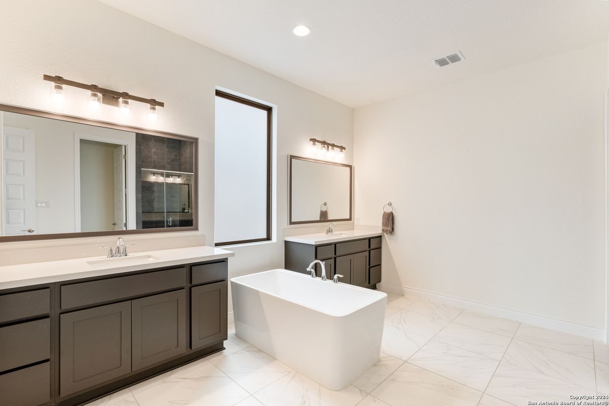 Bathroom, Dual Sink Vanities, Free Standing Baths, Interior, Marble, Recessed Lighting
