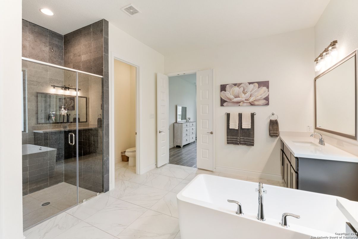 Bathroom, Dual Sink Vanities, Glass Shower, Interior, Marble, Recessed Lighting