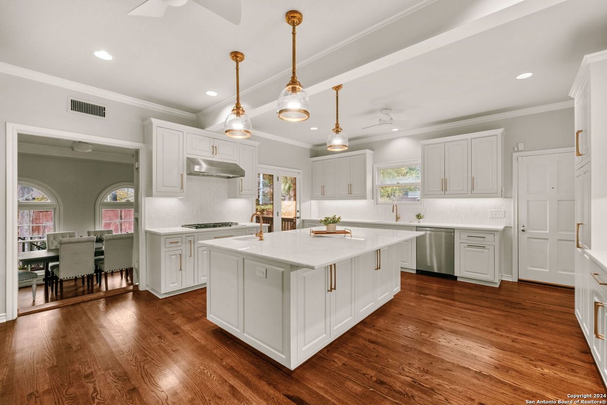 Dining room, Interior, Kitchen, Pendant Lights, Recessed Lighting, Stainless Steel Appliances, Wood Texture Flooring