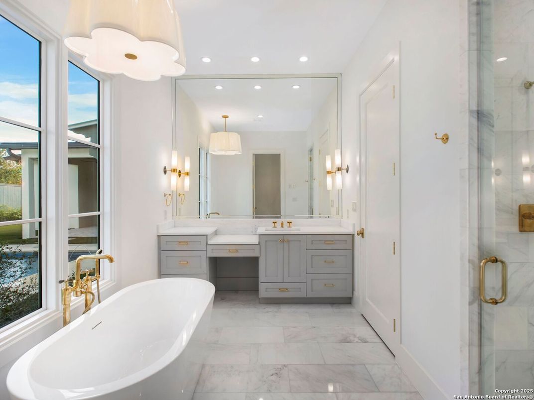 Bathroom, Dual Sink Vanities, Free Standing Baths, Glass Shower, Interior, Marble, Marble Walls, Recessed Lighting