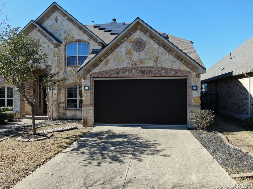 Attached, Exterior, Facade, Solar Panels, Brick Traditional