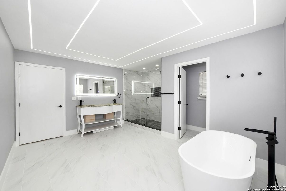 Bathroom, Free Standing Baths, Glass Shower, Interior, Marble, Marble Walls, Recessed Lighting