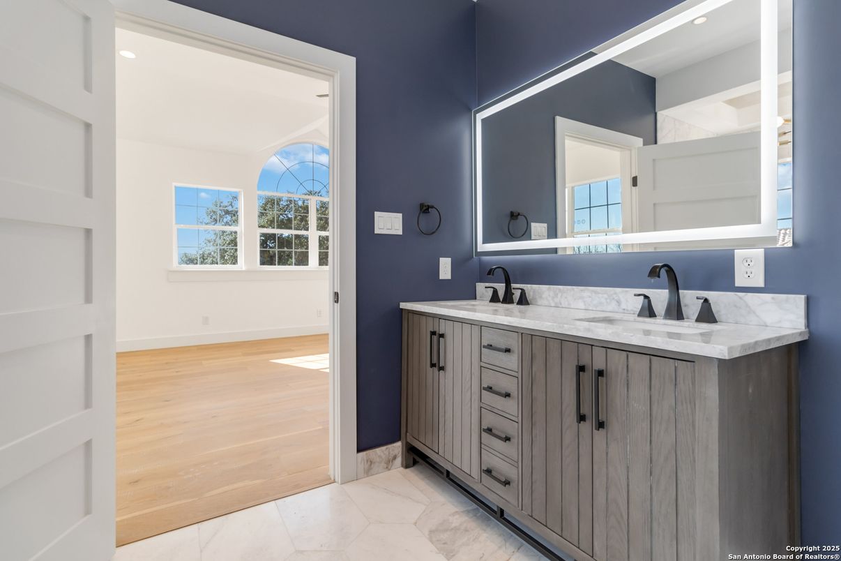 Bathroom, Dual Sink Vanities, Interior, Recessed Lighting, Wood Texture Flooring