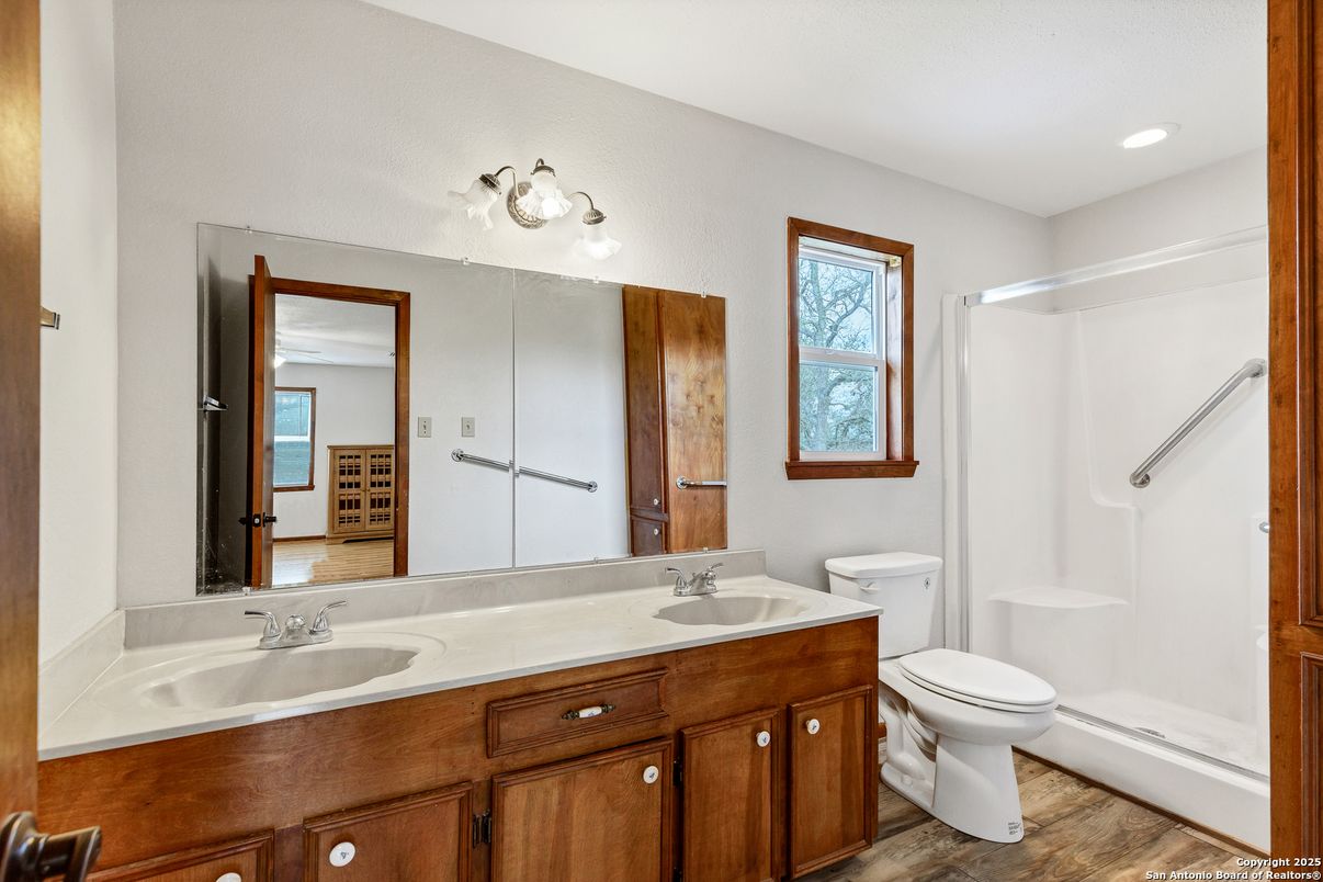 Bathroom, Dual Sink Vanities, Interior, Recessed Lighting, Wood Texture Flooring