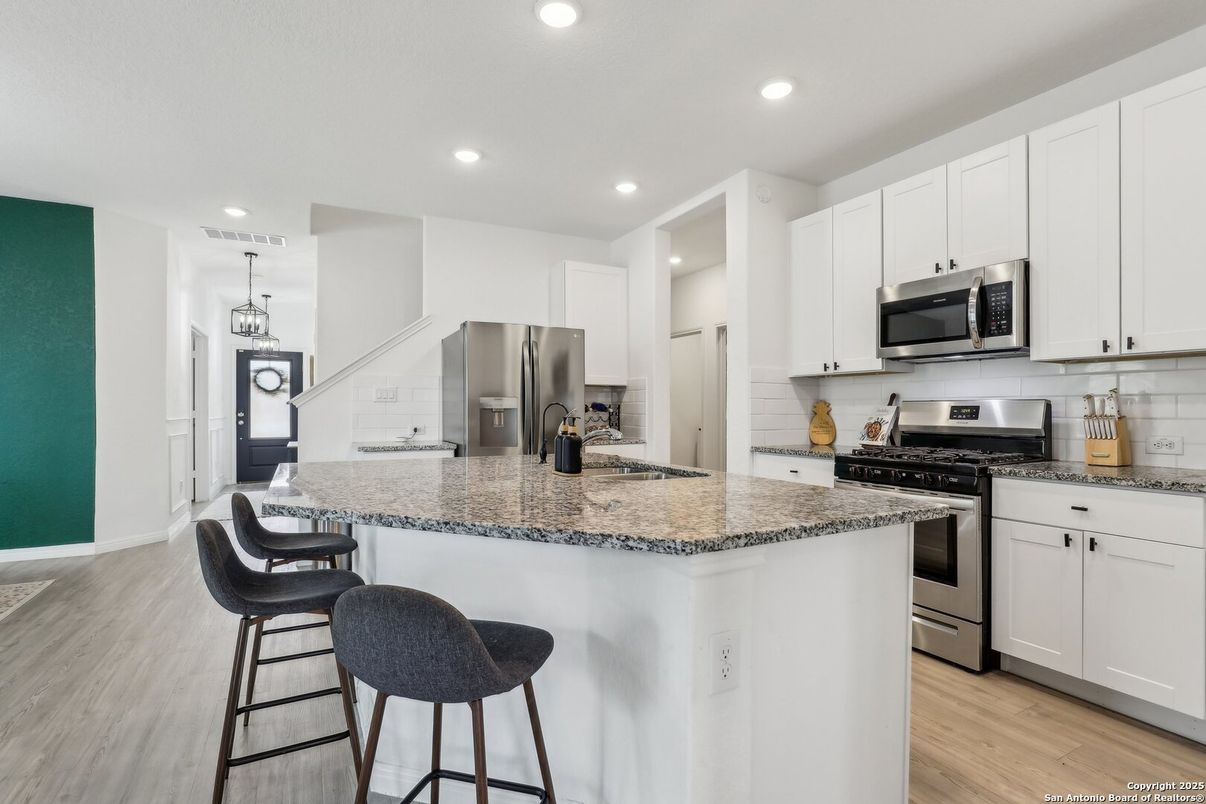 Interior, Kitchen, Pendant Lights, Recessed Lighting, Stainless Steel Appliances, Wood Texture Flooring
