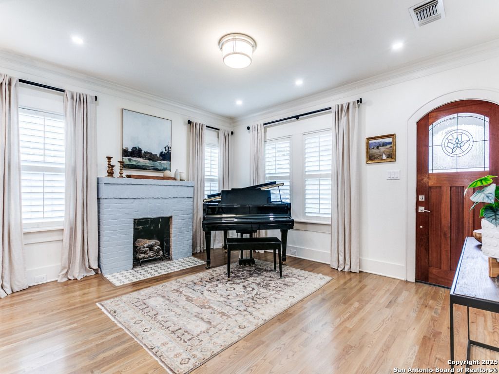 Fireplace, Interior, Piano, Recessed Lighting, Wood Texture Flooring