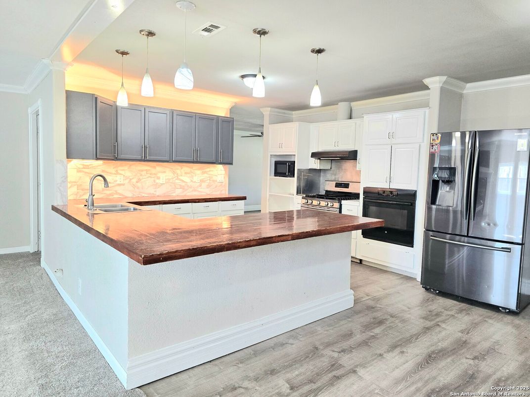 Interior, Kitchen, Pendant Lights, Stainless Steel Appliances, Wood Texture Flooring