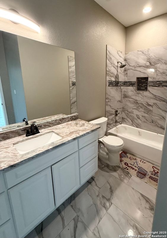 Bathroom, Dual Sink Vanities, Interior, Marble, Marble Walls, Recessed Lighting