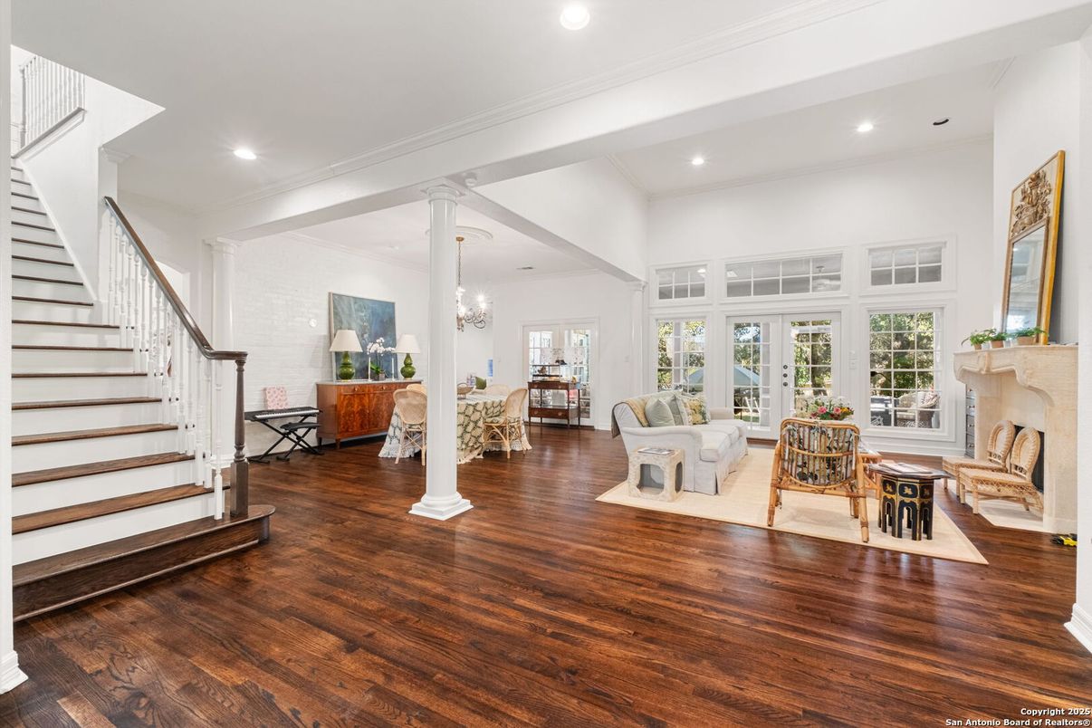 Chandelier, Dining room, Fireplace, Interior, Living room, Recessed Lighting, Wood Texture Flooring