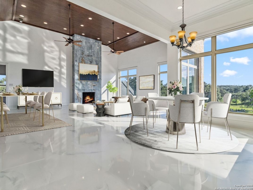 Chandelier, Dining room, Fireplace, Interior, Living room, Marble, Pendant Lights, Recessed Lighting, Wooden Ceilings