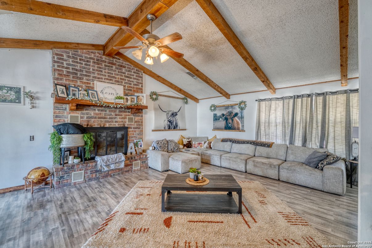 Fireplace, Interior, Living room, Stone Walls, Wooden Beams, Wood Texture Flooring