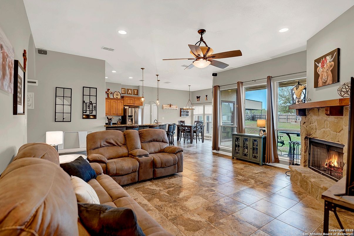Dining room, Fireplace, Interior, Kitchen, Living room, Pendant Lights, Recessed Lighting, Stainless Steel Appliances