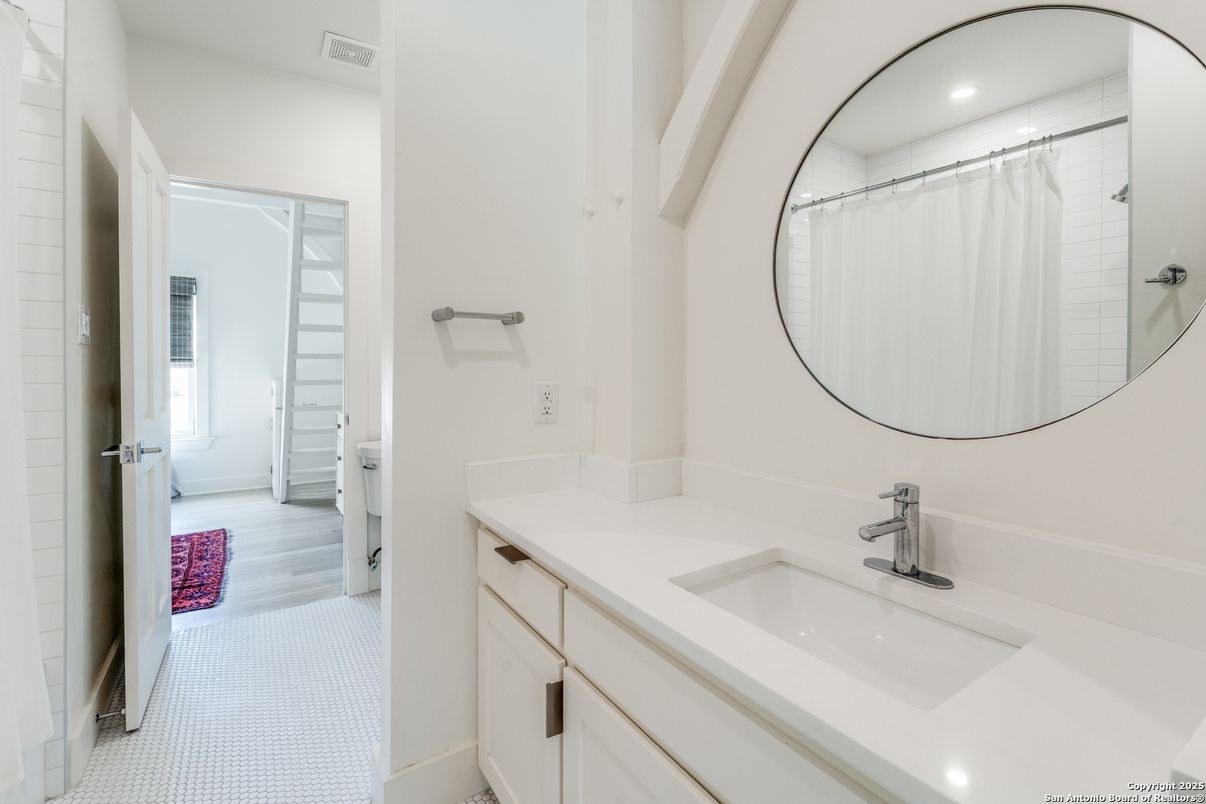 Bathroom, Dual Sink Vanities, Interior, Recessed Lighting, Wood Texture Flooring