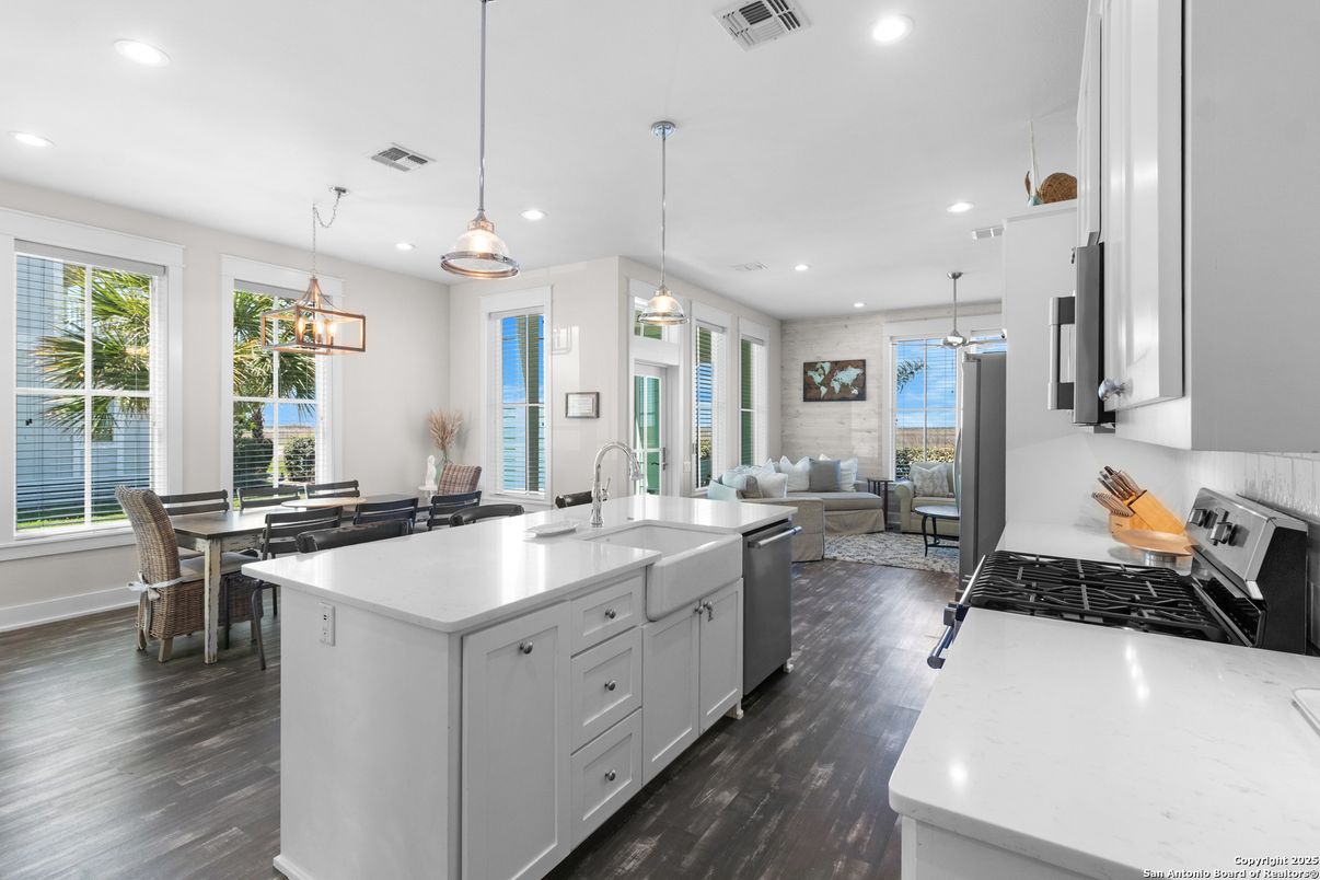 Dining room, Interior, Kitchen, Living room, Pendant Lights, Recessed Lighting, Stainless Steel Appliances, Wood Texture Flooring