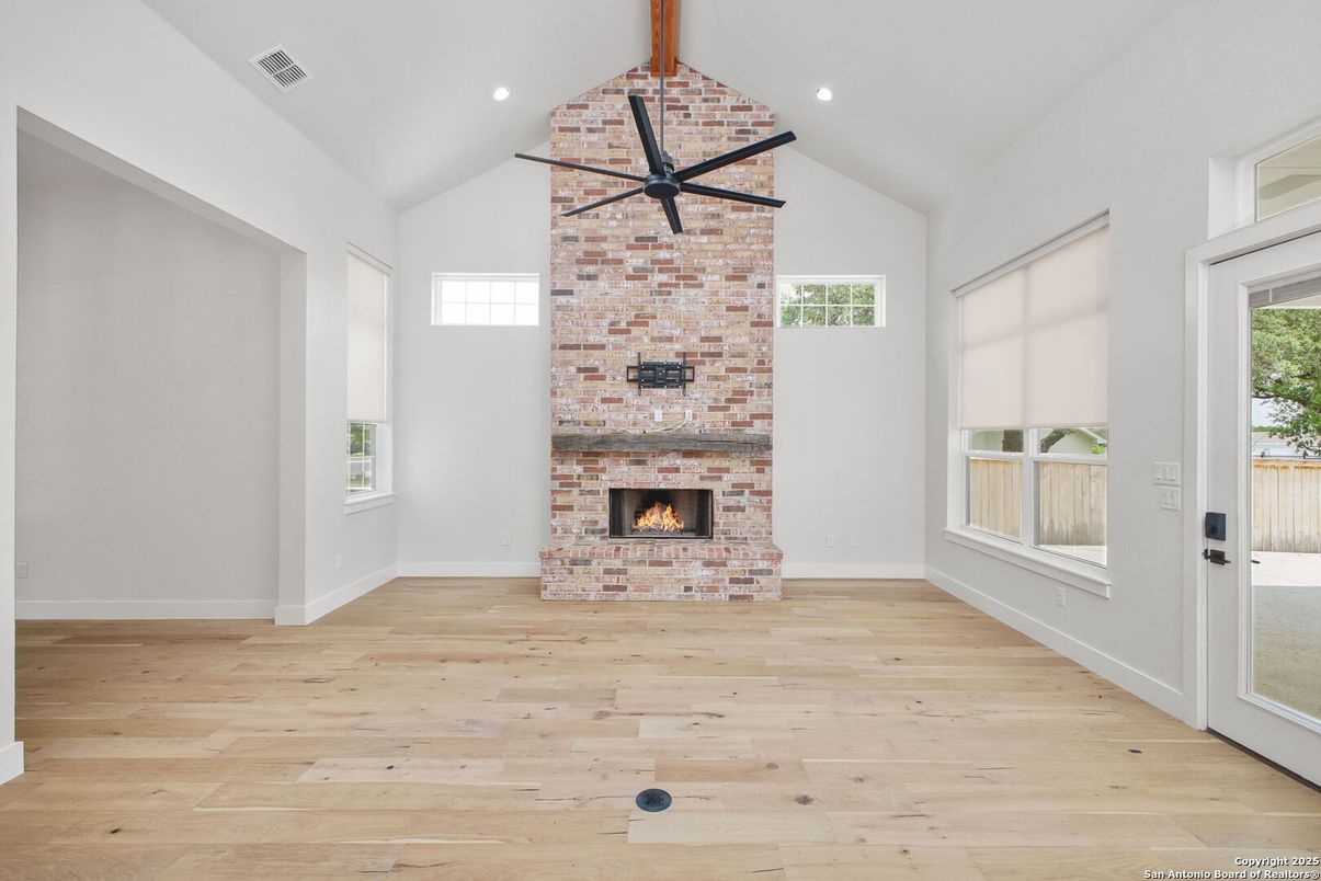 Empty room, Fireplace, Interior, Recessed Lighting, Wood Texture Flooring