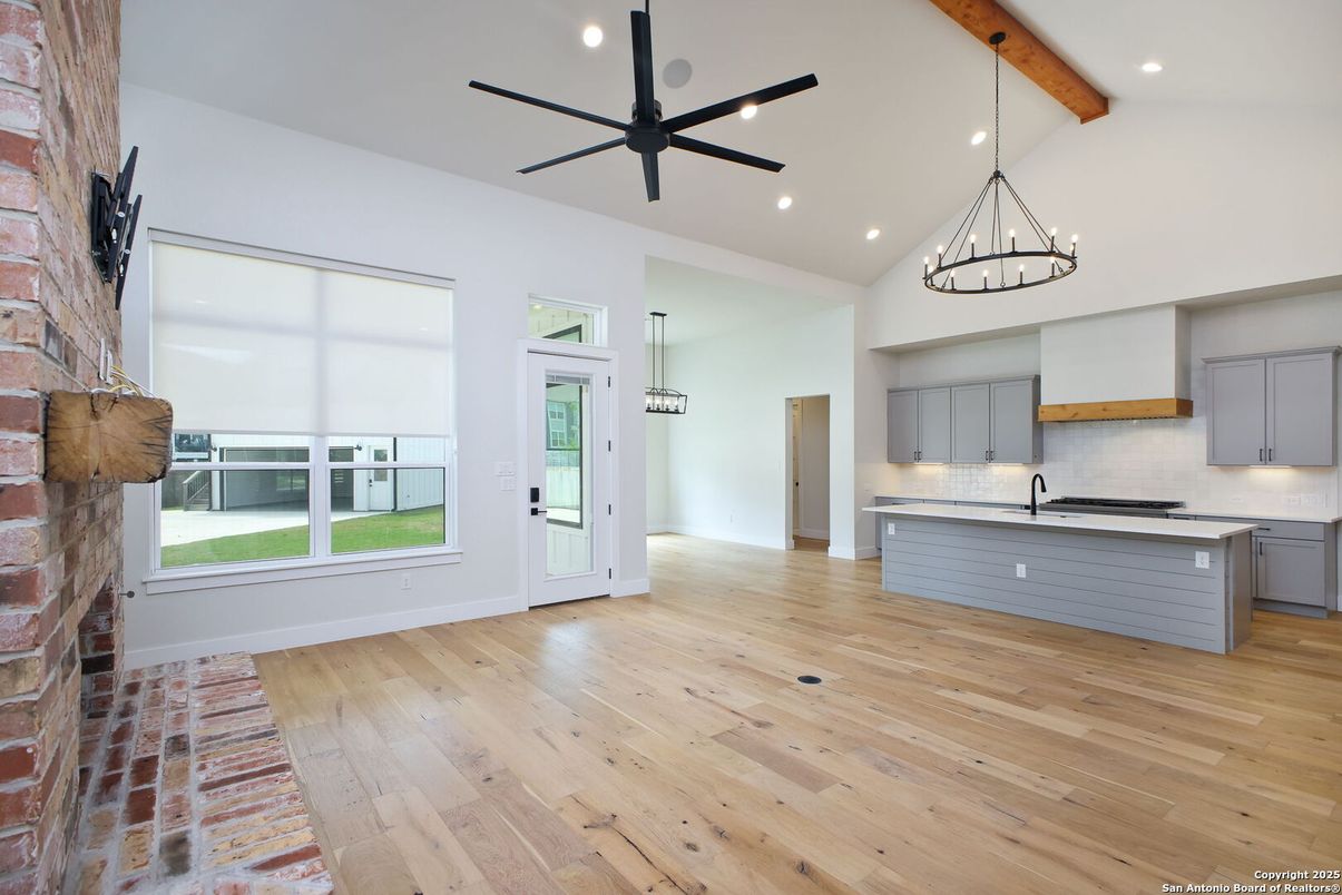Chandelier, Empty room, Interior, Kitchen, Pendant Lights, Recessed Lighting, Wooden Beams, Wood Texture Flooring