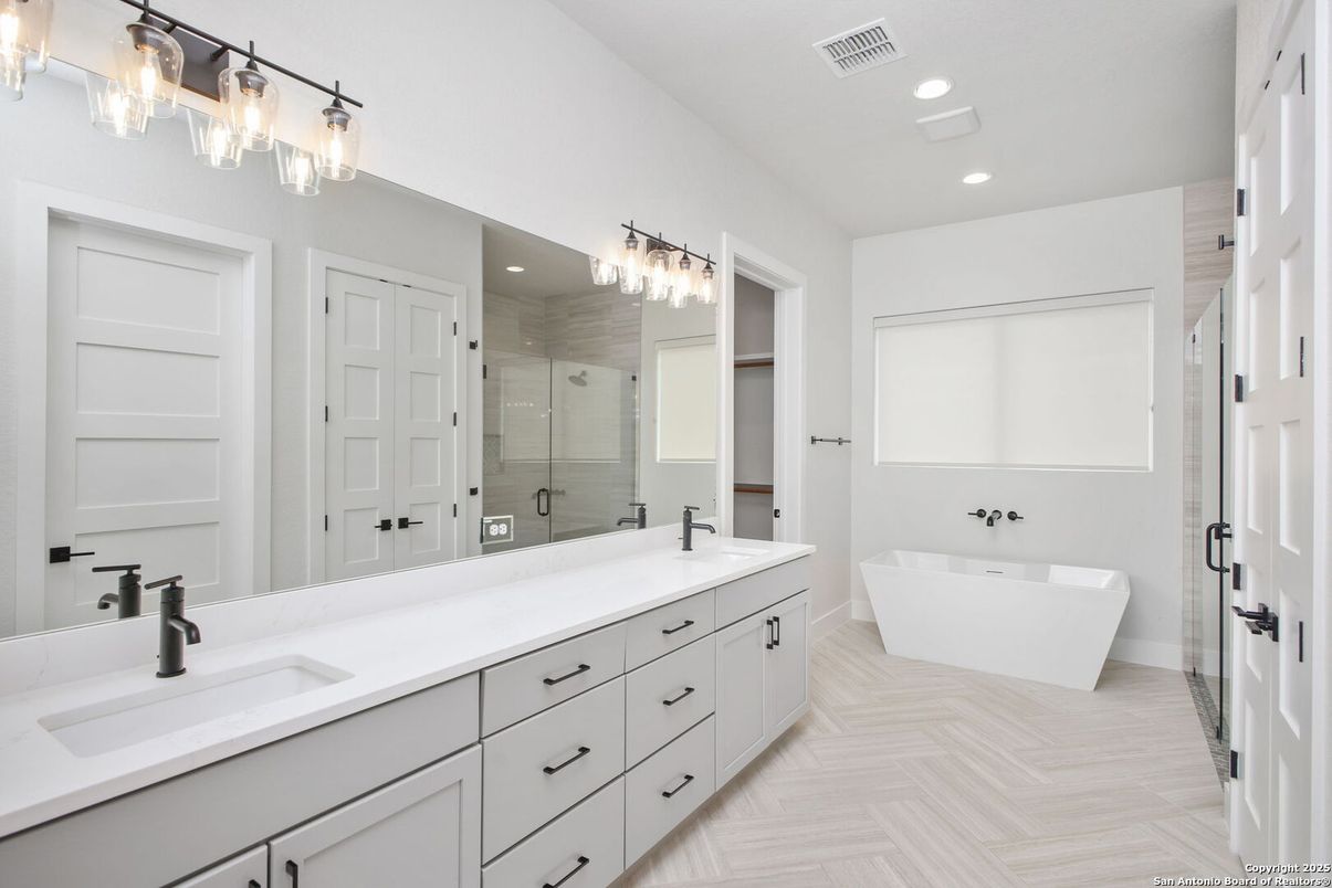 Bathroom, Dual Sink Vanities, Free Standing Baths, Glass Shower, Interior, Recessed Lighting